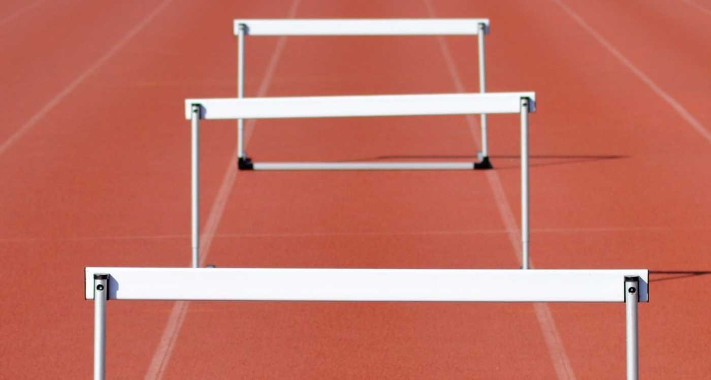 A series of hurdles on a running track