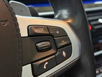 BMW M550 Xdrive — foto 13 de 27
