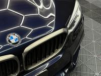 BMW M550 Xdrive — foto 5 de 27