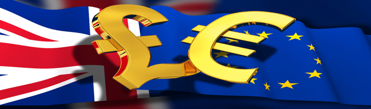 The flags of Britain and European Union side by side with the Pound sign and Euro sign in gold on top of the flags.