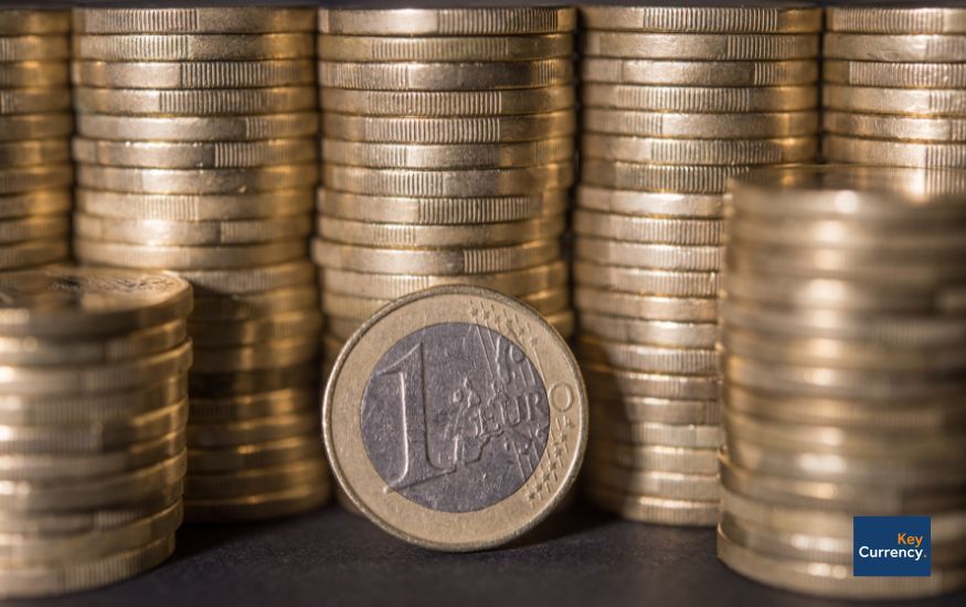Euro coins stacked on top of each other in a close-up photo.