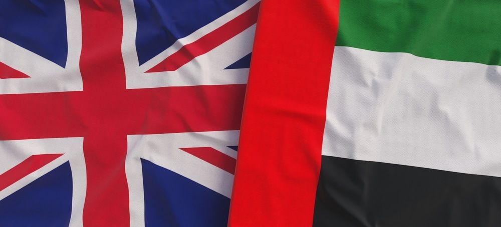 Great Britain flag and the UAE flag side by side.