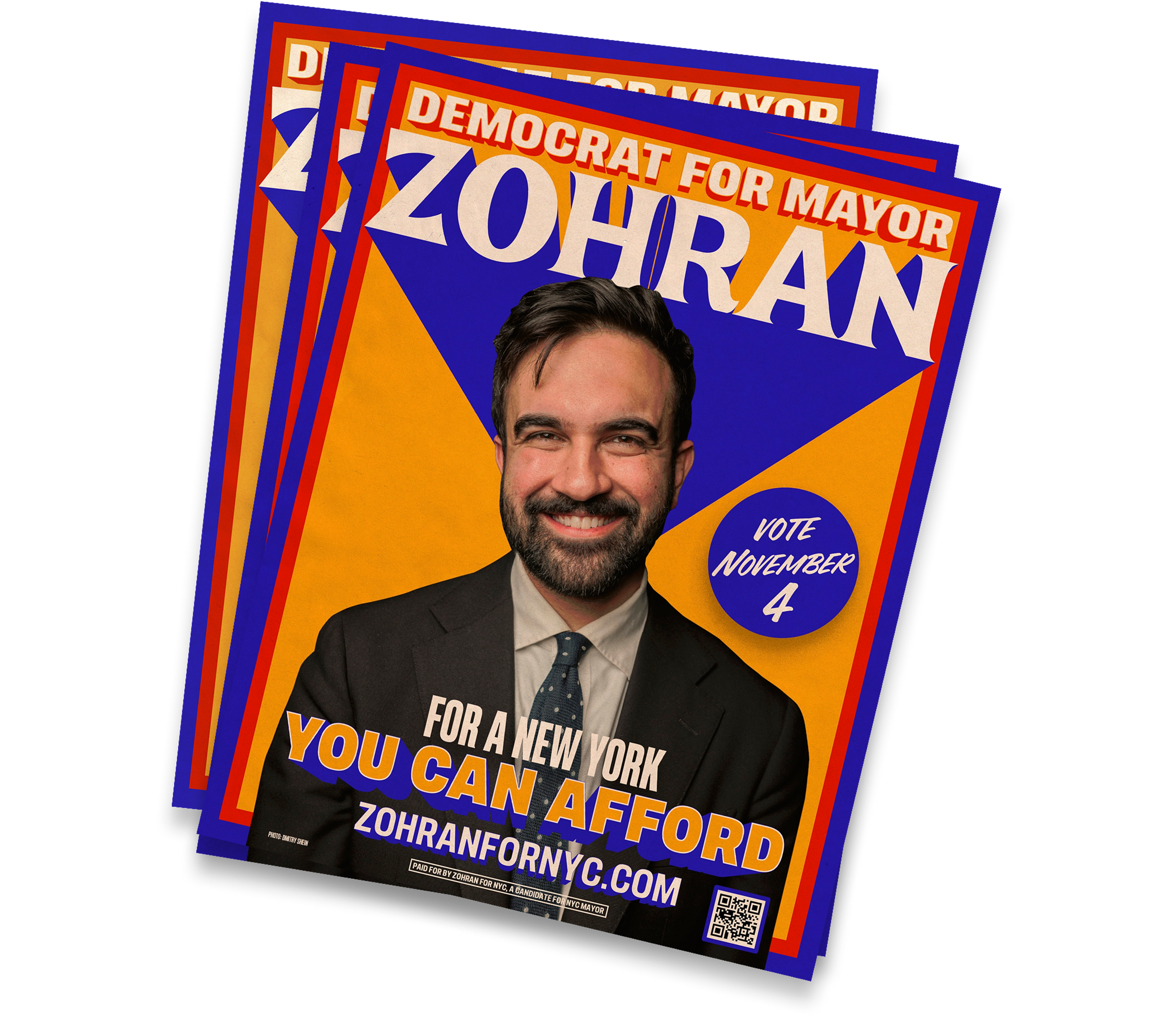A stack of posters.The poster features a picture of Zohran and reads "Democrat for Mayor. Zohran: For a New York you can afford. Vote November 4." 