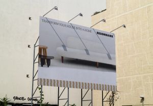 A billboard featuring an advertisement for Resonnaire