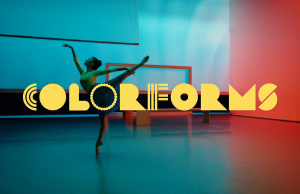 A woman dancing in a room blue and red lighting overlayed with the COLORFORMS logo in yellow