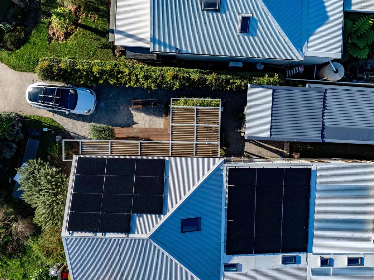 Australian family with rooftop solar photographed for Austrade net zero campaign
