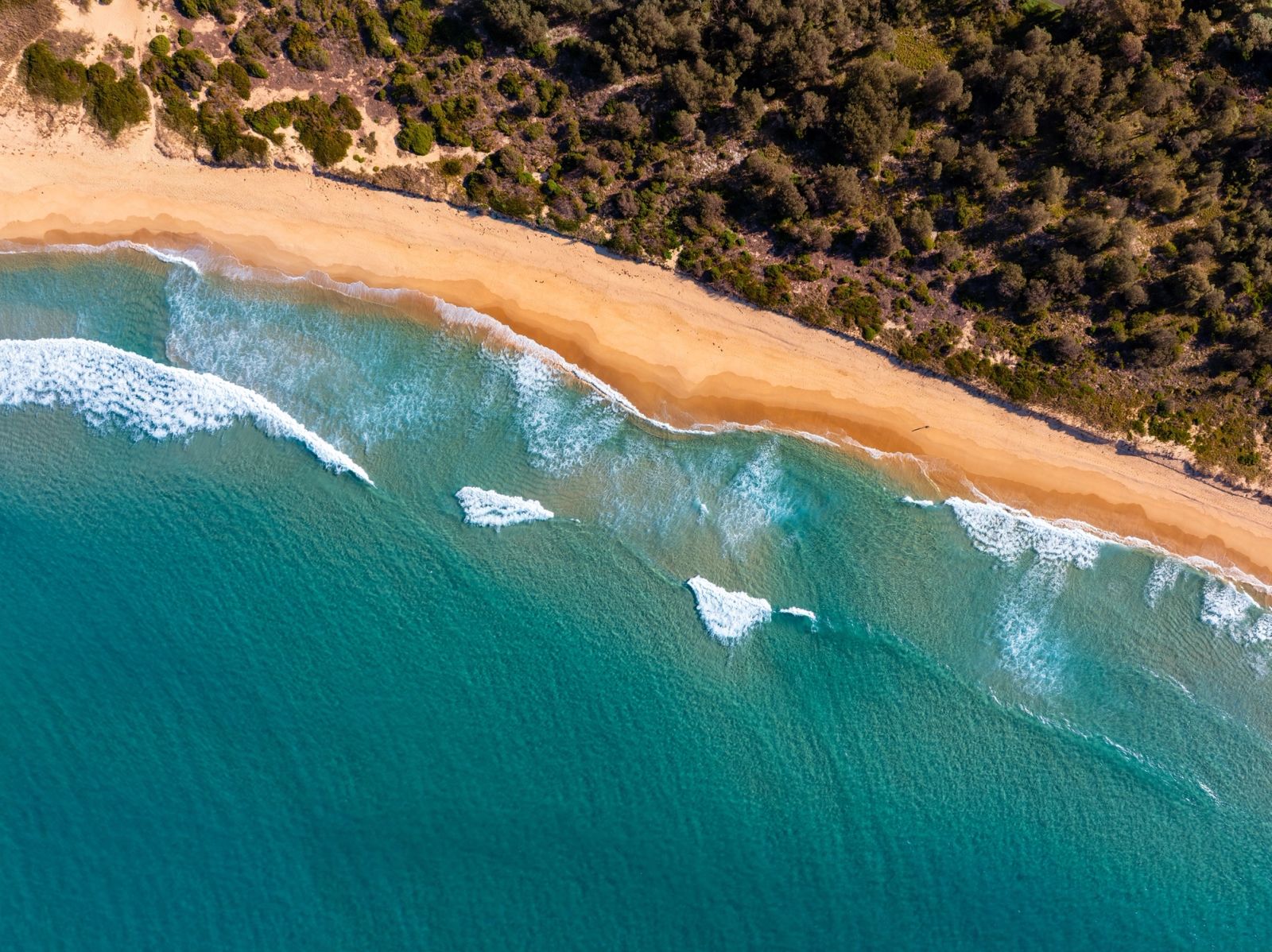 CASA-licensed drone in flight over Australian landscape - commercial aerial photography