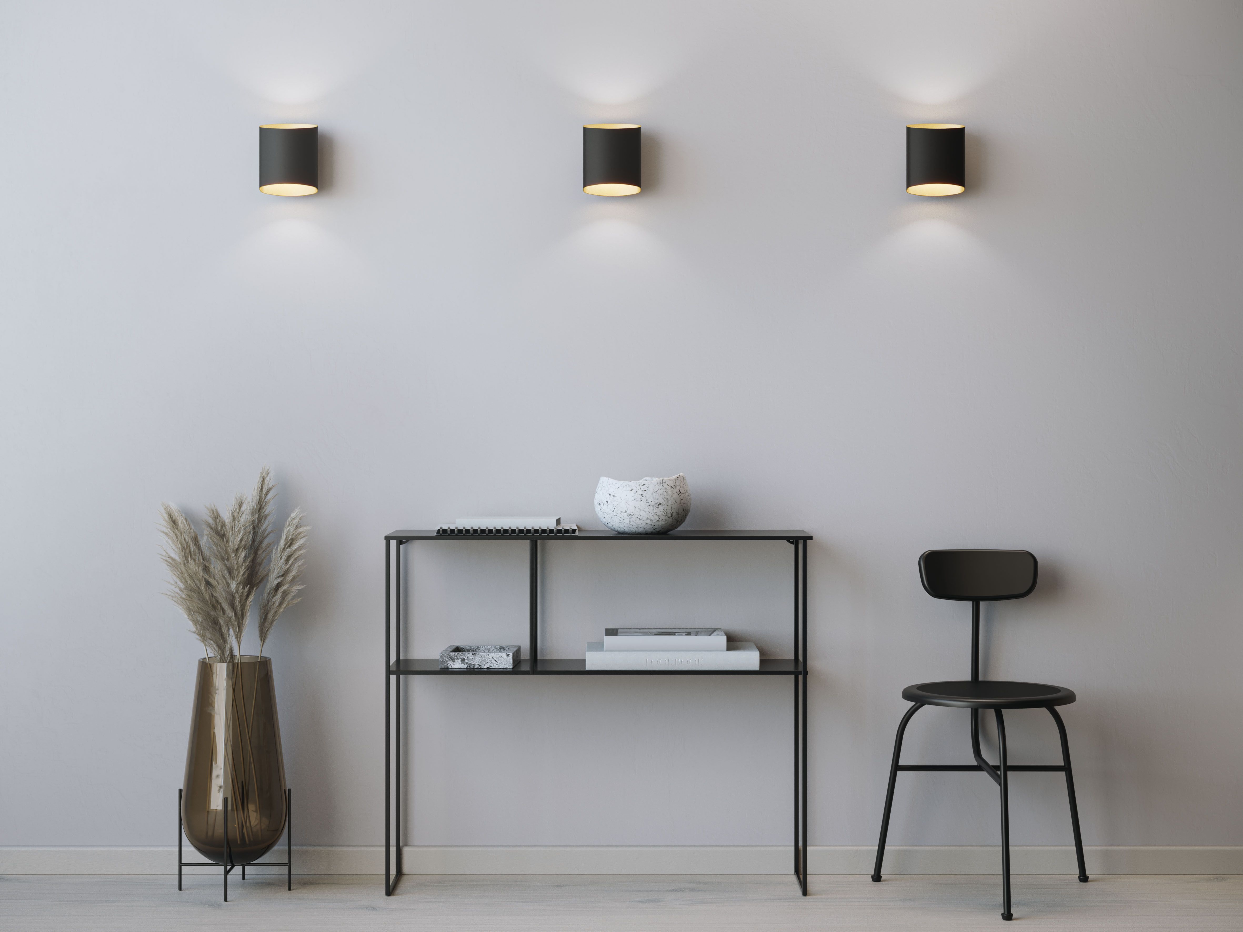 Three wall lamps on a row