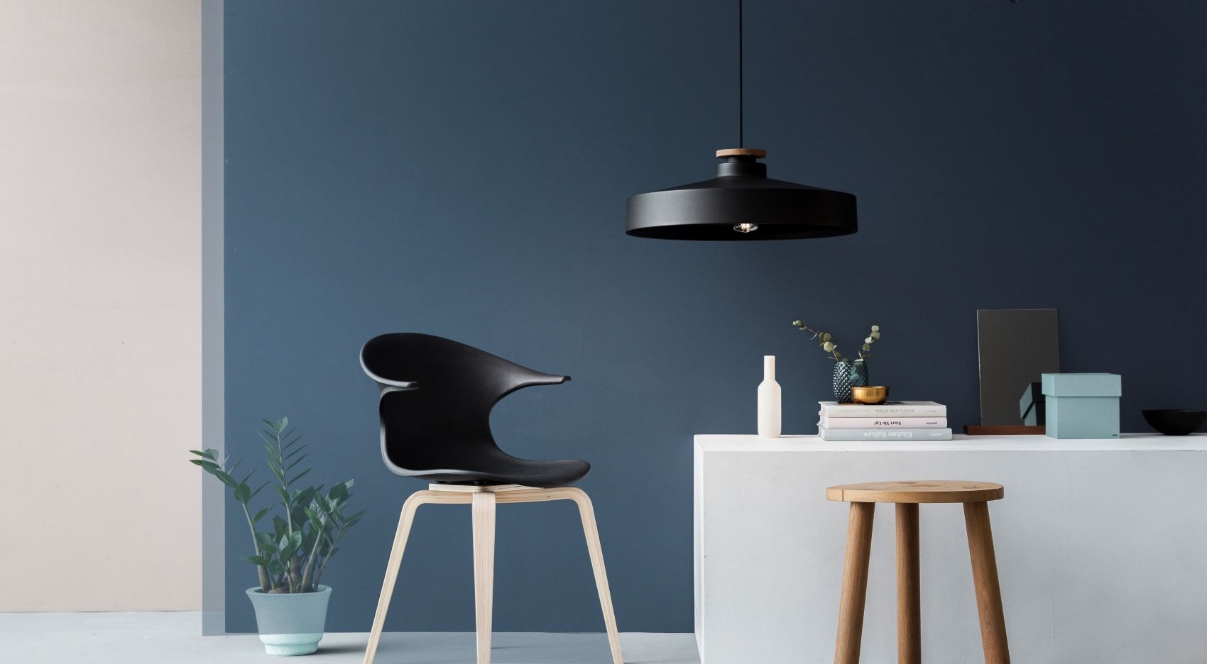 Black pendant over kitchen table
