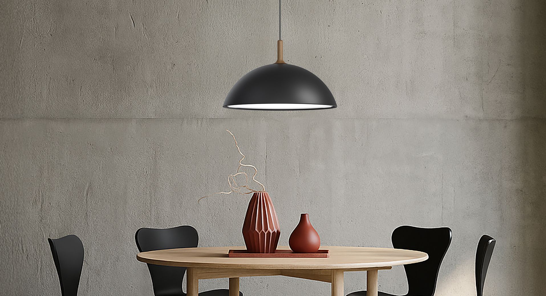 White pendant over red kitchen table