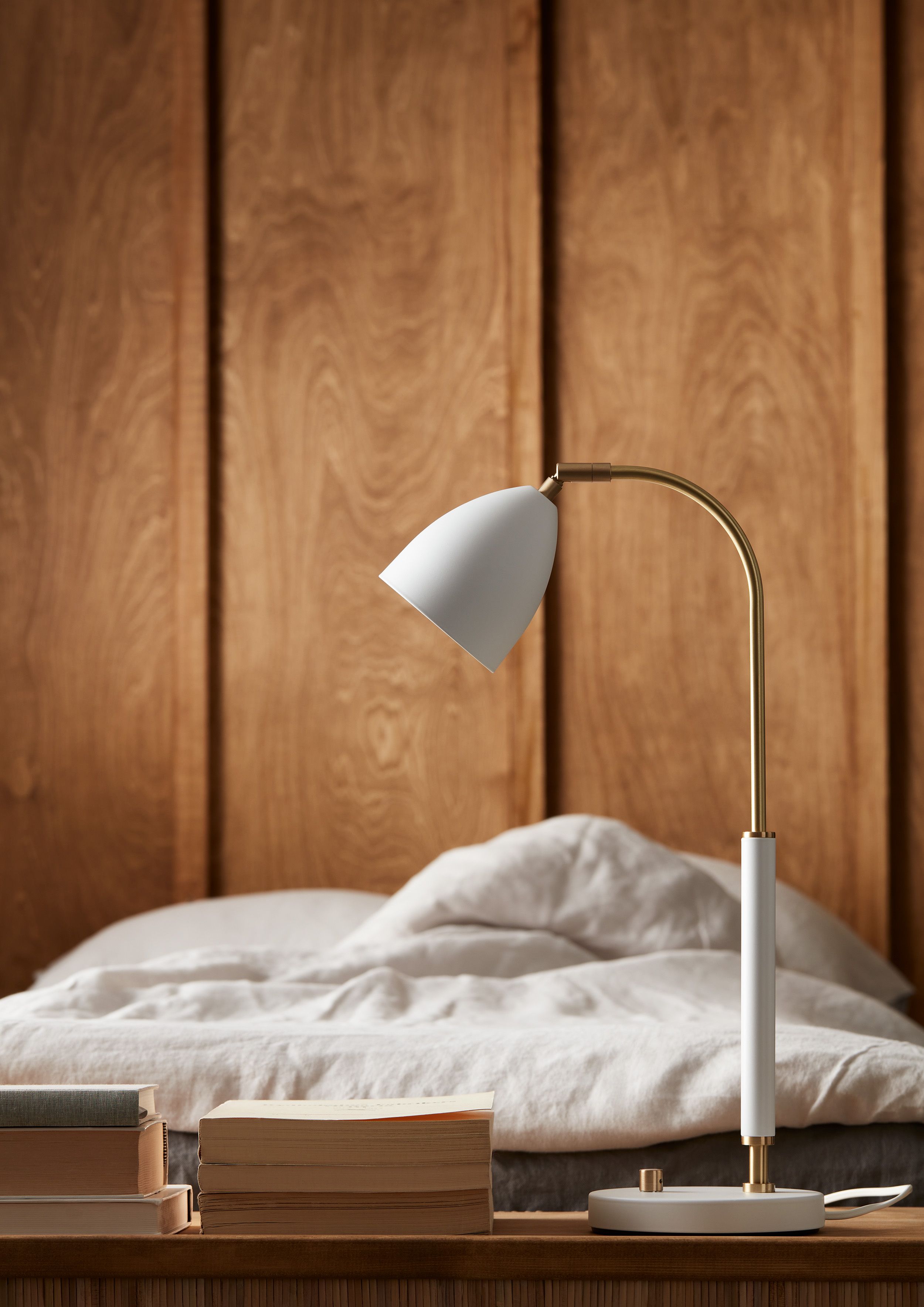 White table lamp on a side table