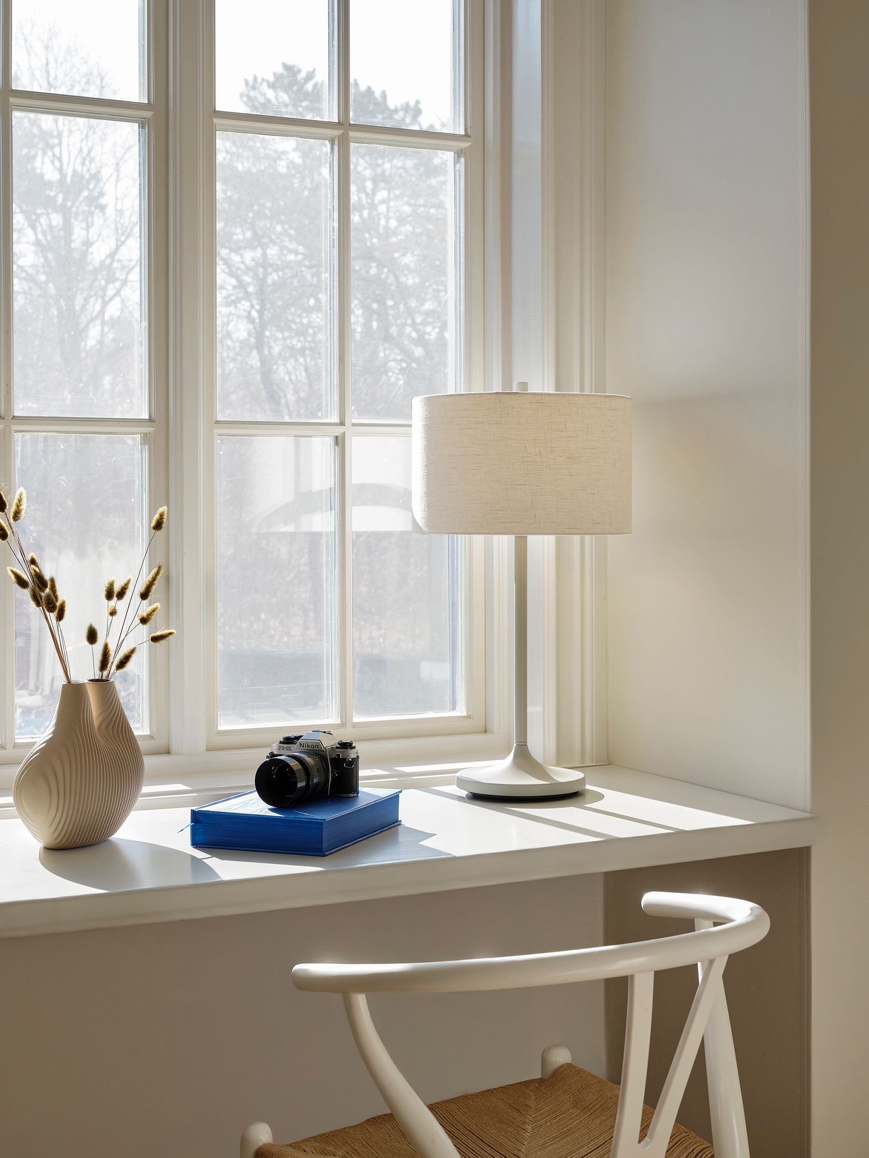 Soft table lamp by a window