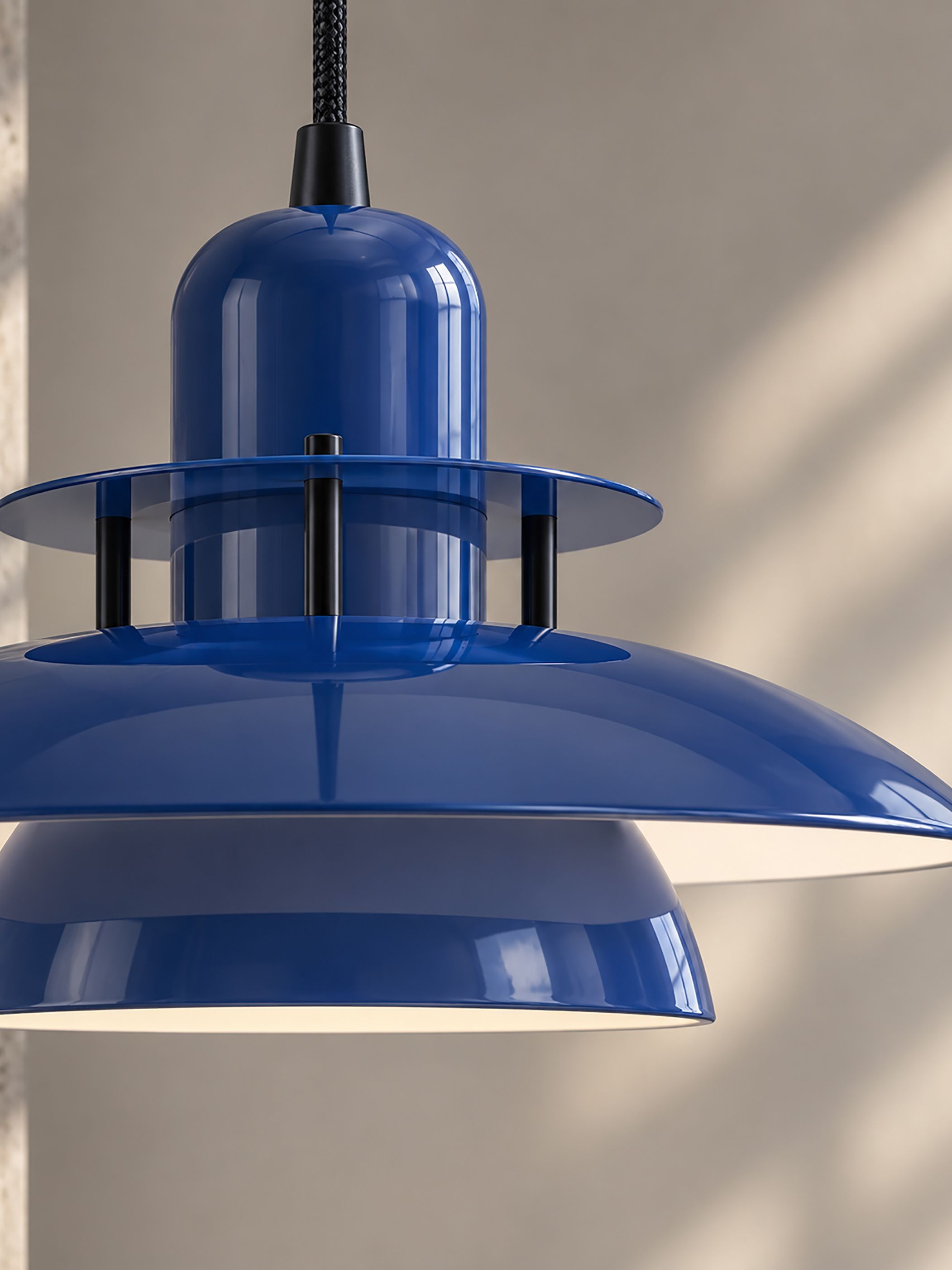 Detail of Primus IV pendant in deep blue and flat black