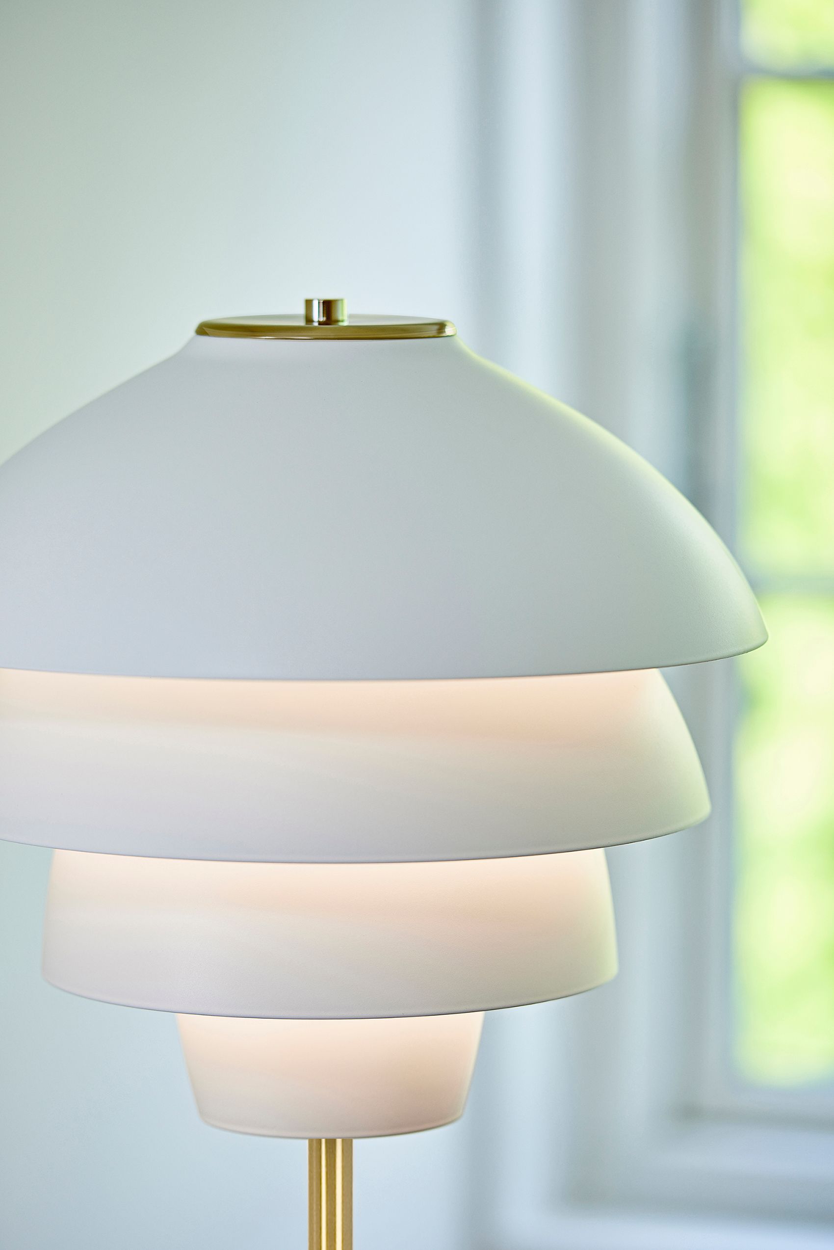 Detail of Valencia floor lamp in flat white and brass