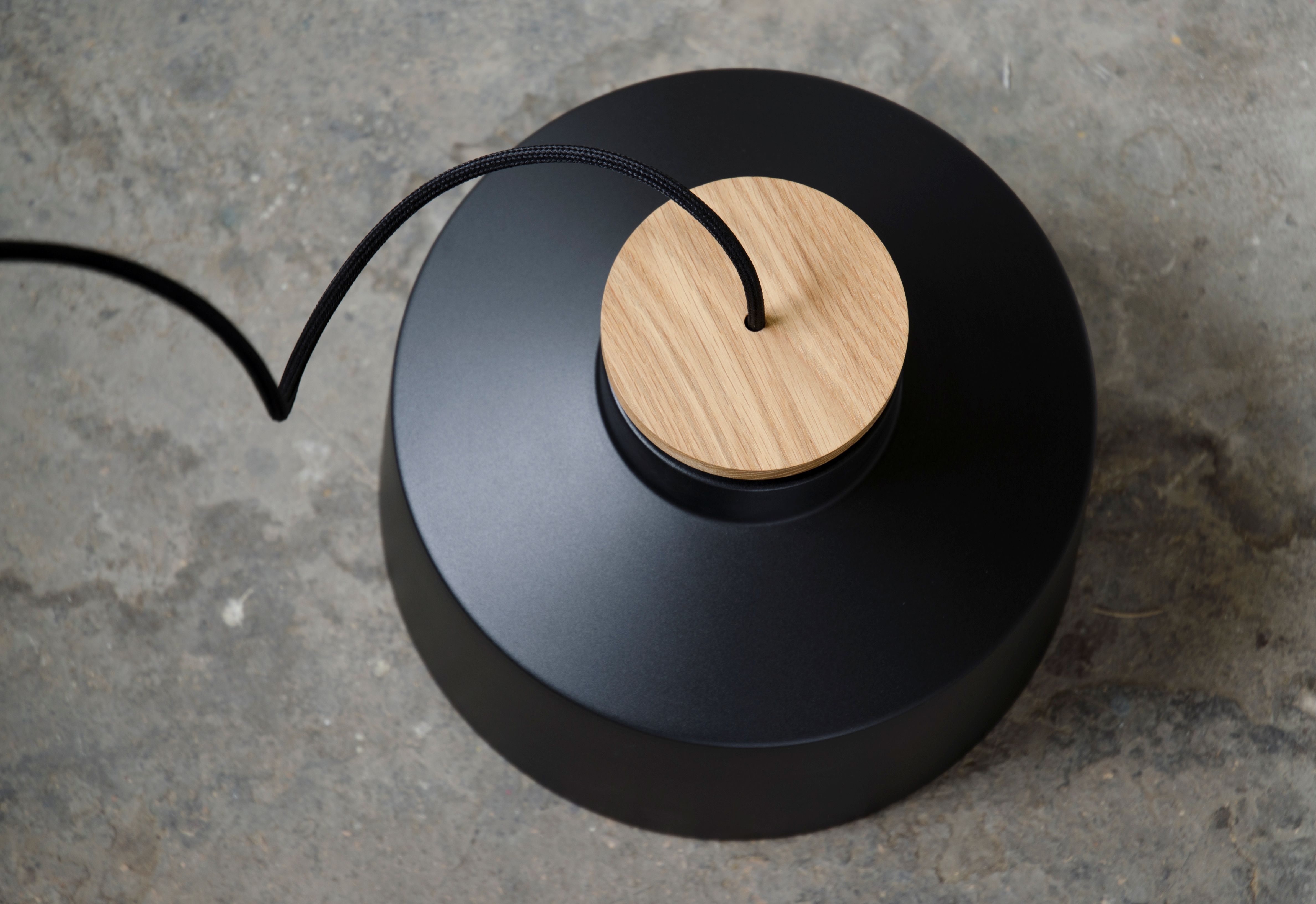 Oak details on black pendant