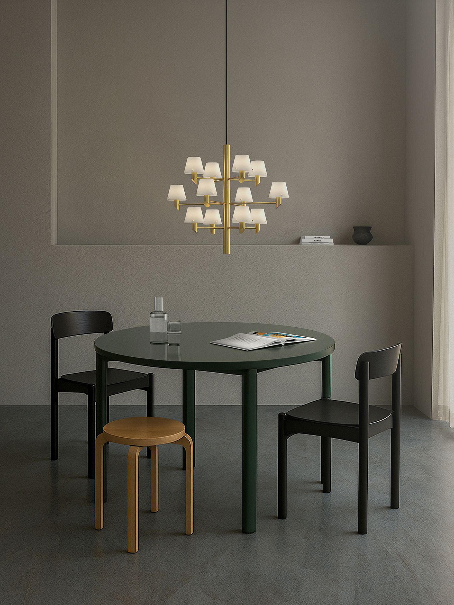 Gil Chandelier 12 in satin brass/opal glass over a dining table
