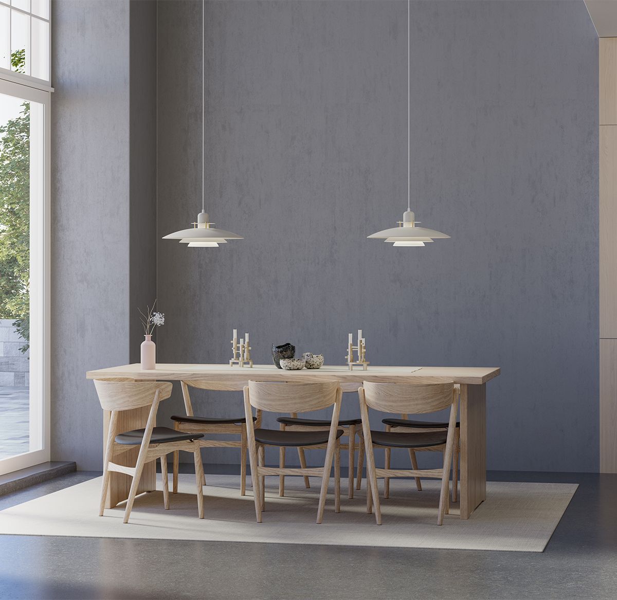 Two primus pendants over a kitchen table