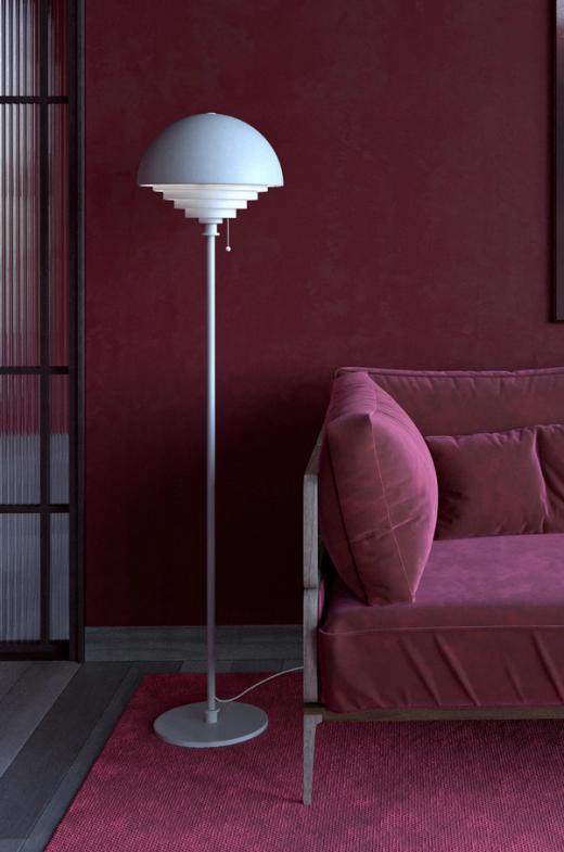 White table lamp on a pink carpet