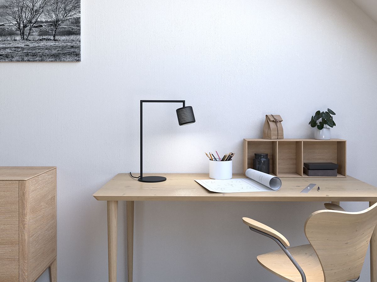 Black table lamp on desk