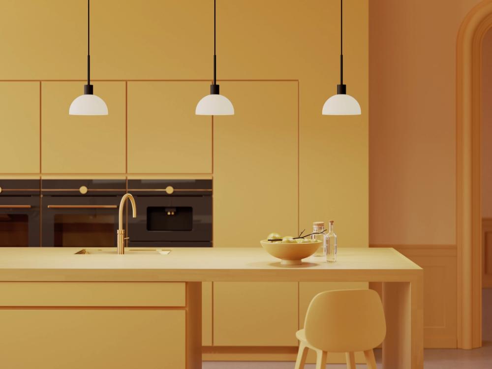 Three pendant lamps over a kitchen island
