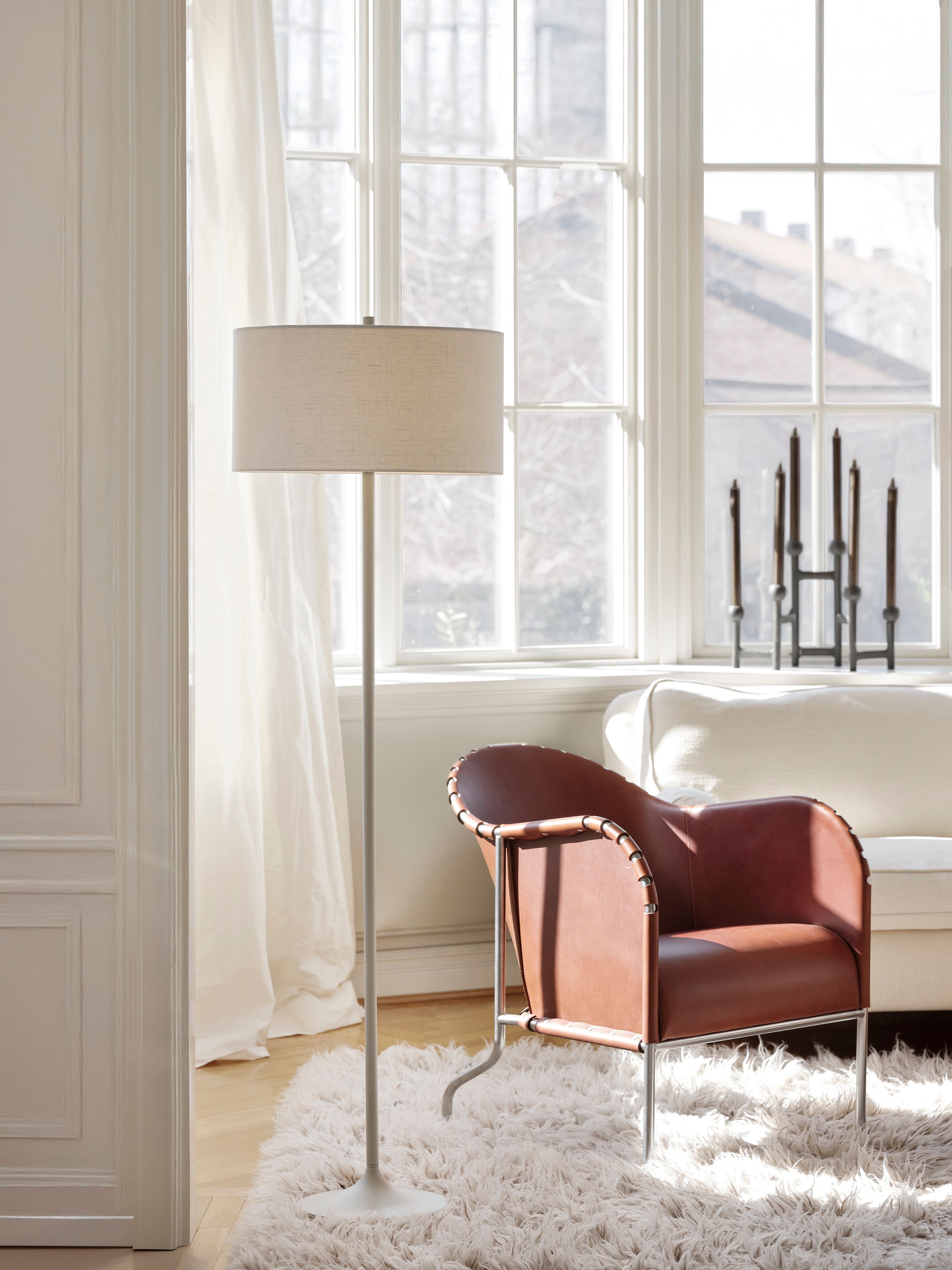 Soft Floor lamp beside an armchair