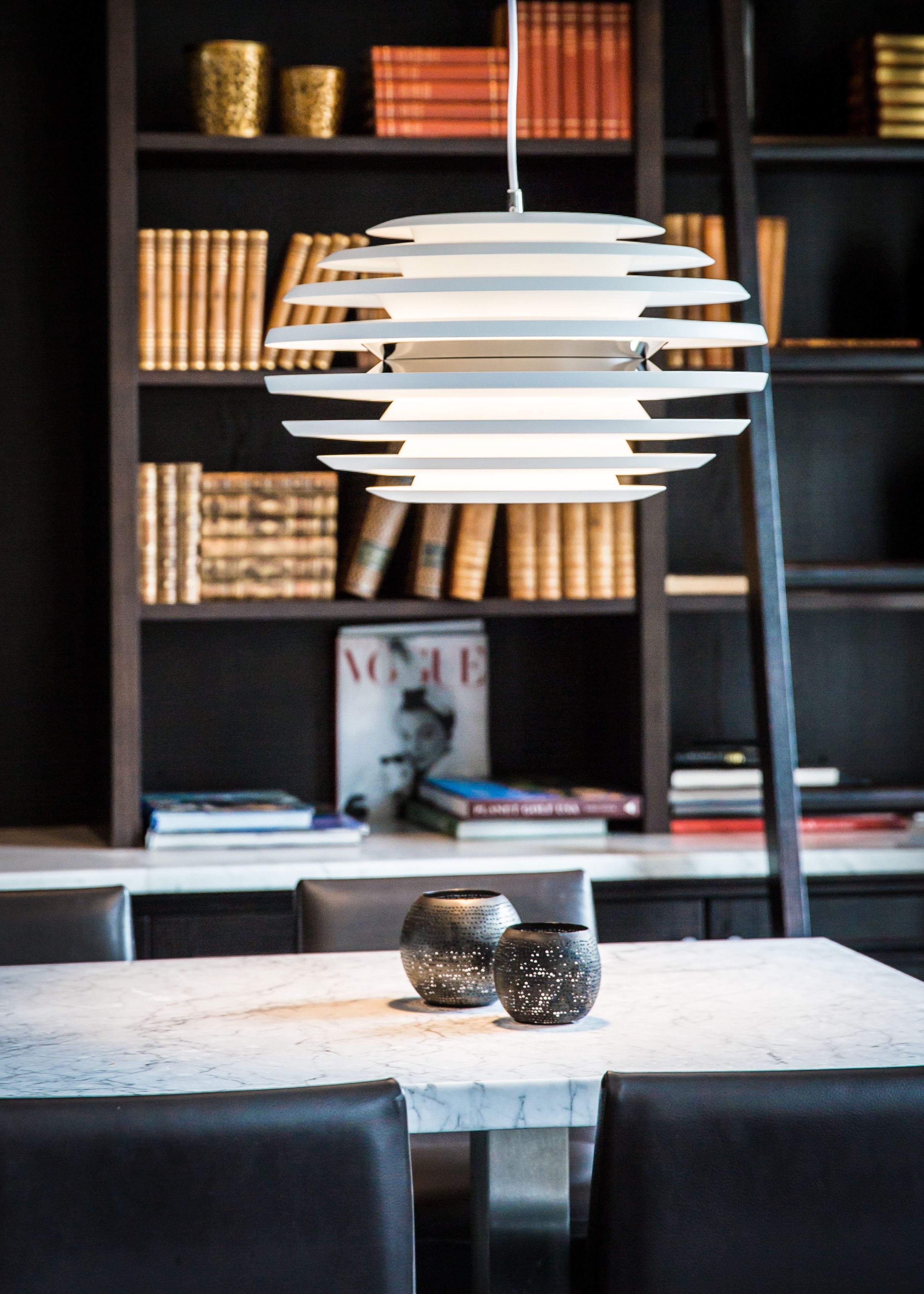 White pendant over a table 