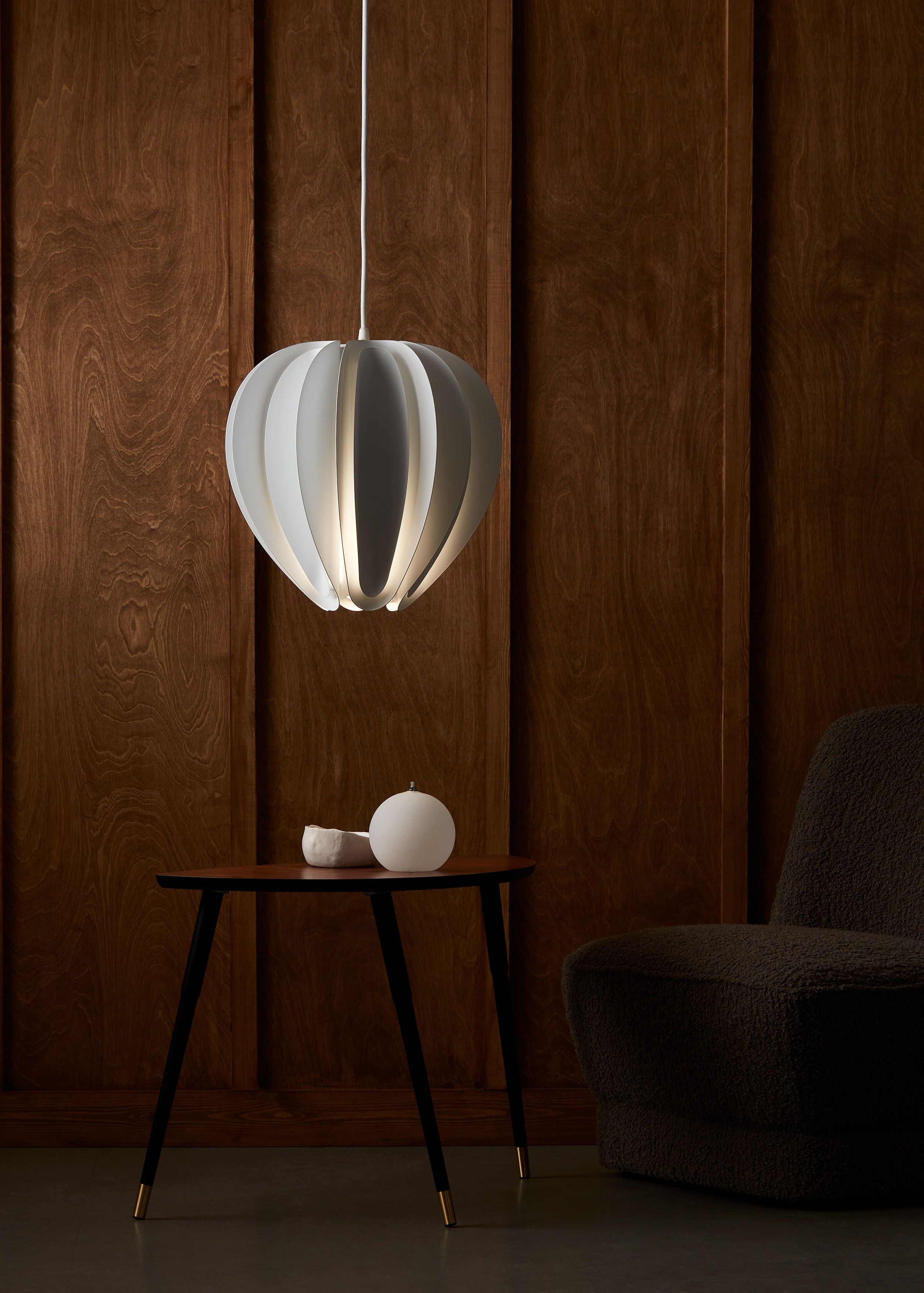 White pendant over a table 