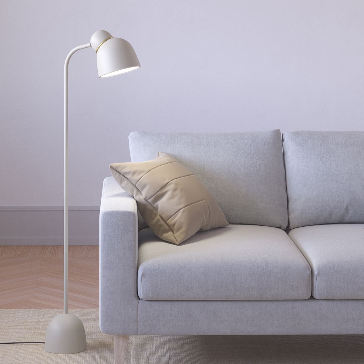 Bird floor lamp beside a sofa