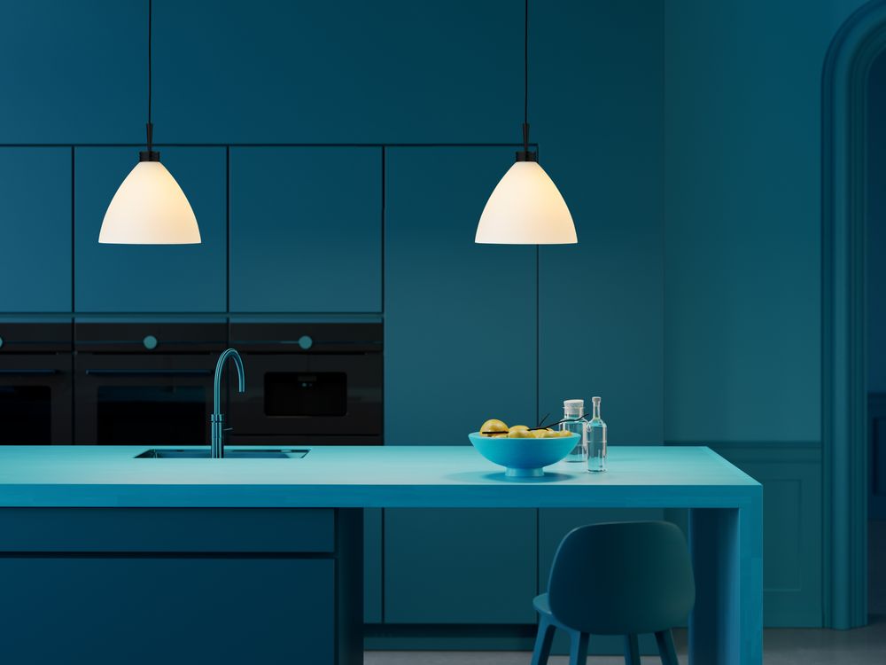 Two pendant lamps over a kitchen island