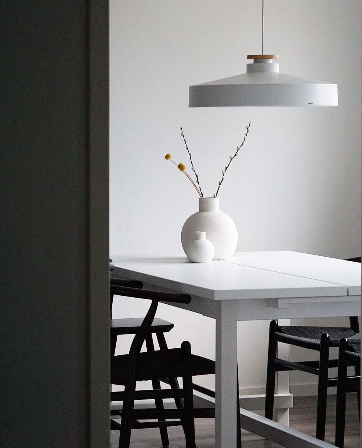 White pendant over kitchen table