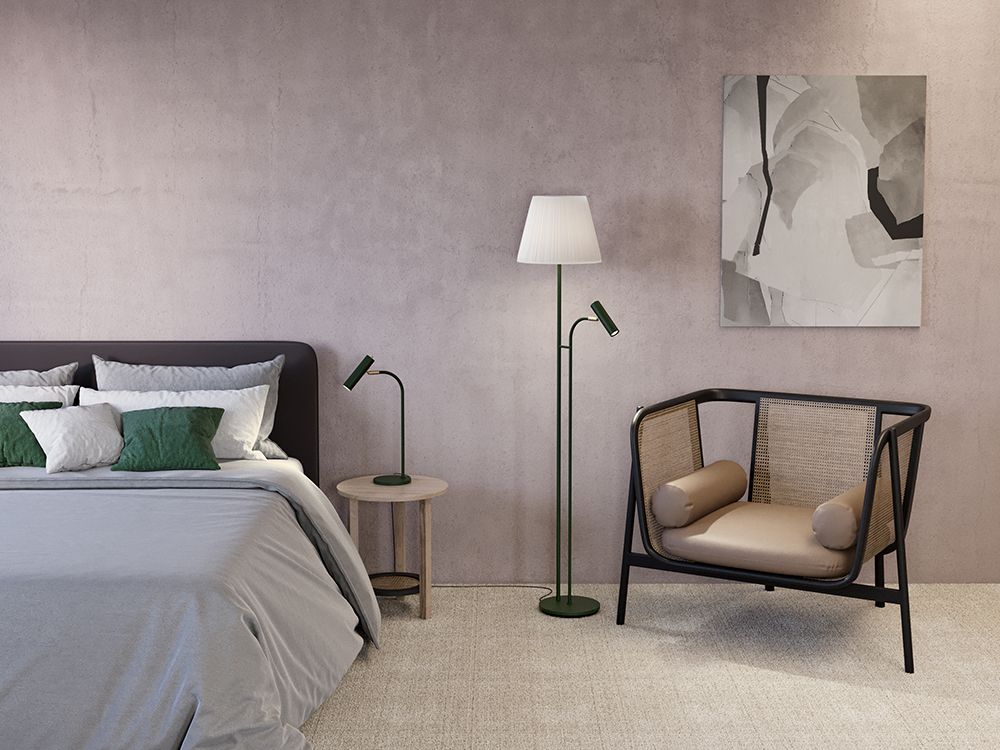 Slender floorlamp with shade and table lamp in the bedroom 