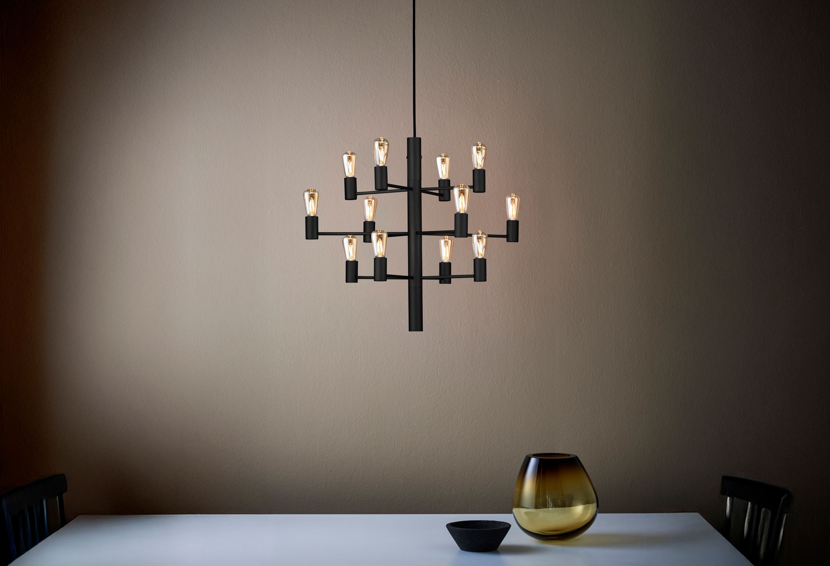 Black pendant  above a kitchen table