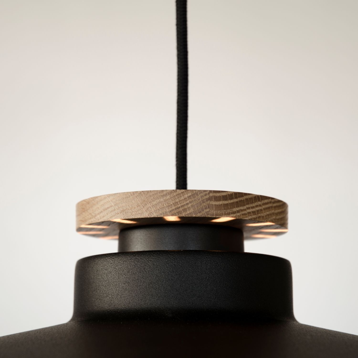 Oak details on black pendant