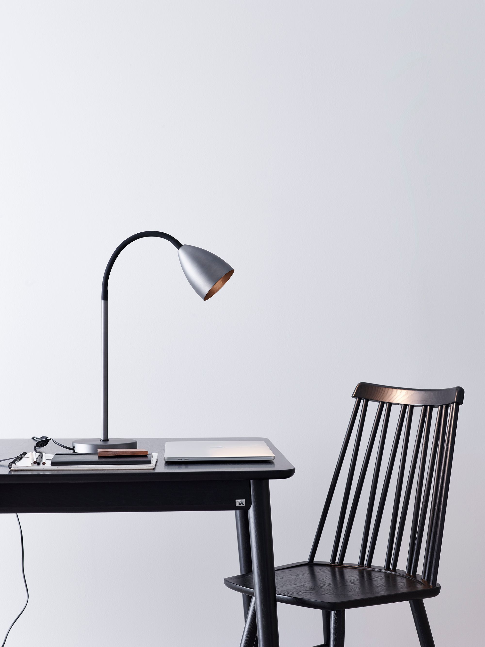 Trotsig table lamp on a desk