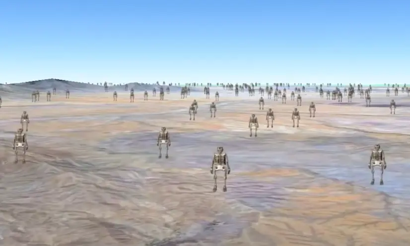 Numerous iron skeleton sculptures stand on a landscape with distant mountains under a clear, blue sky.
