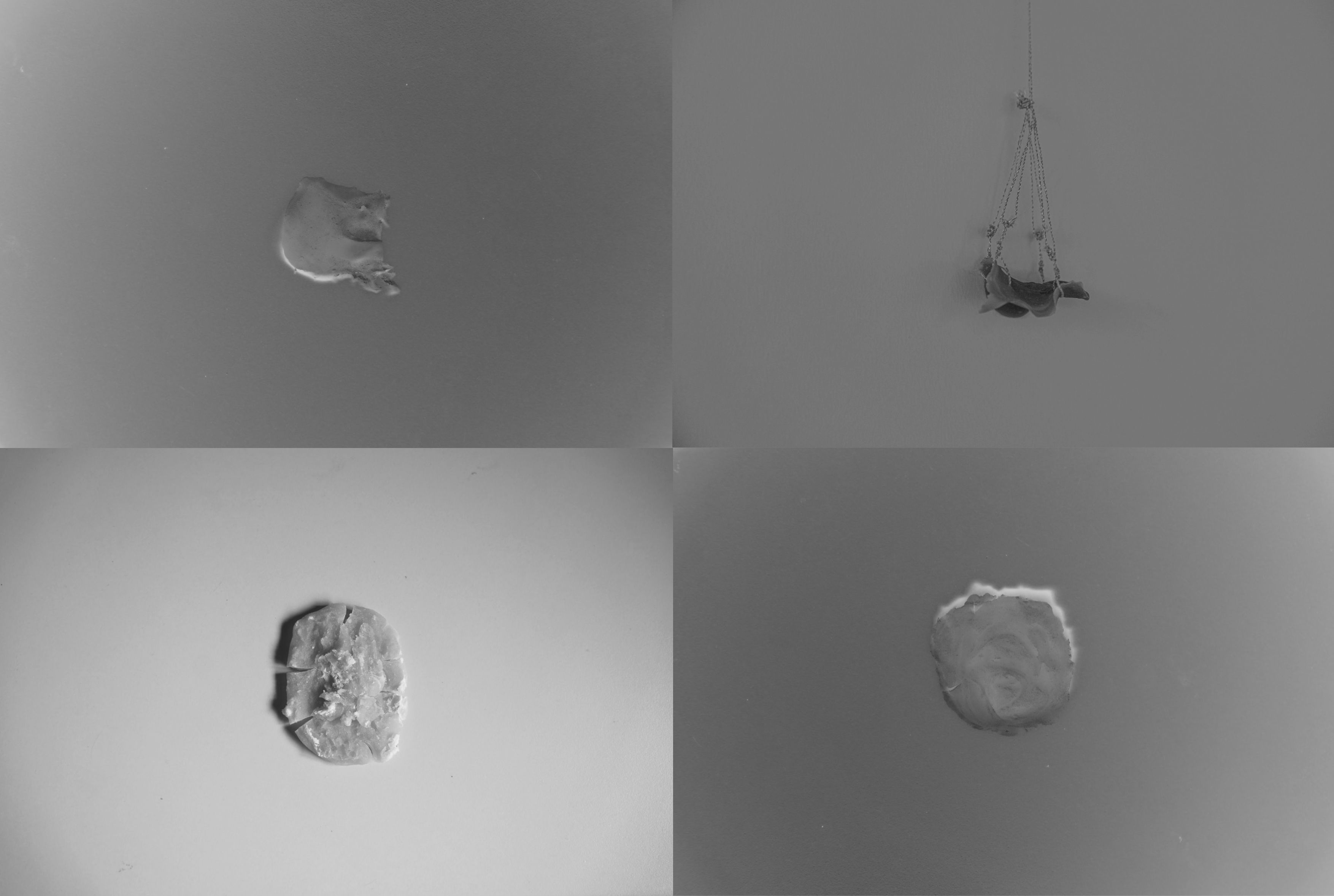 A black and white diptych of photographs of three round objects, one hanging object.