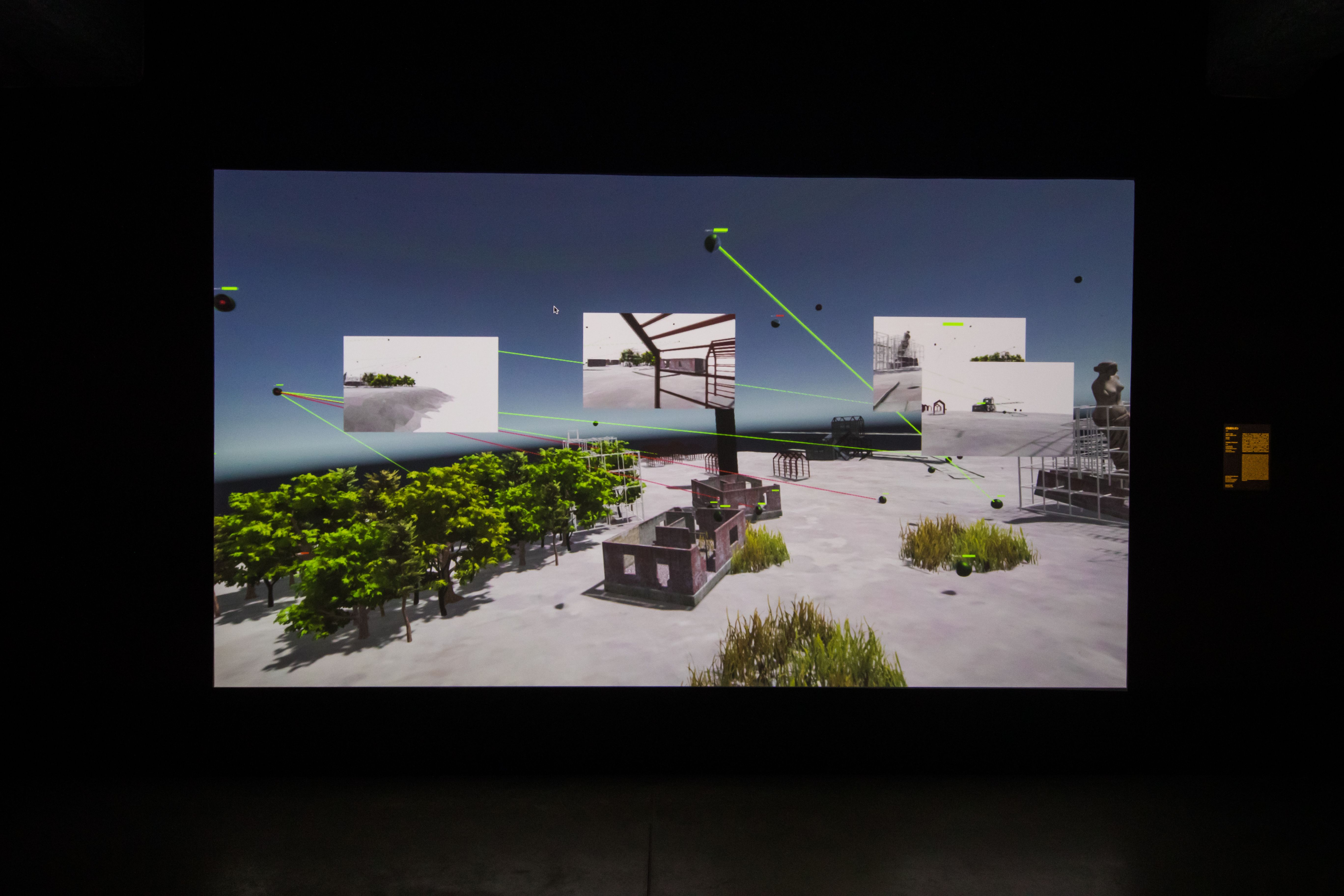 Large projection of a 3D virtual space with green lines connecting different elements.