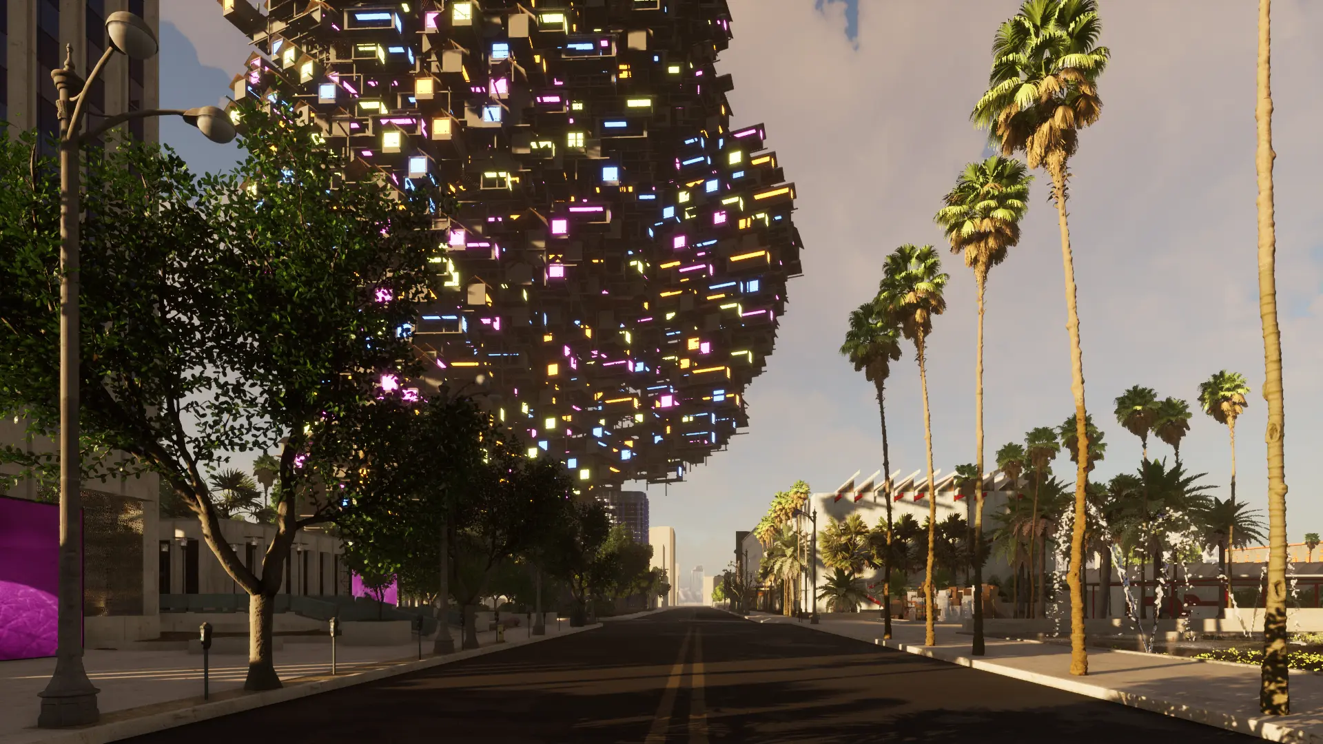 Street view of a public space lined with trees under a daylight sky. A bulbous building is adorned with vibrant lights.