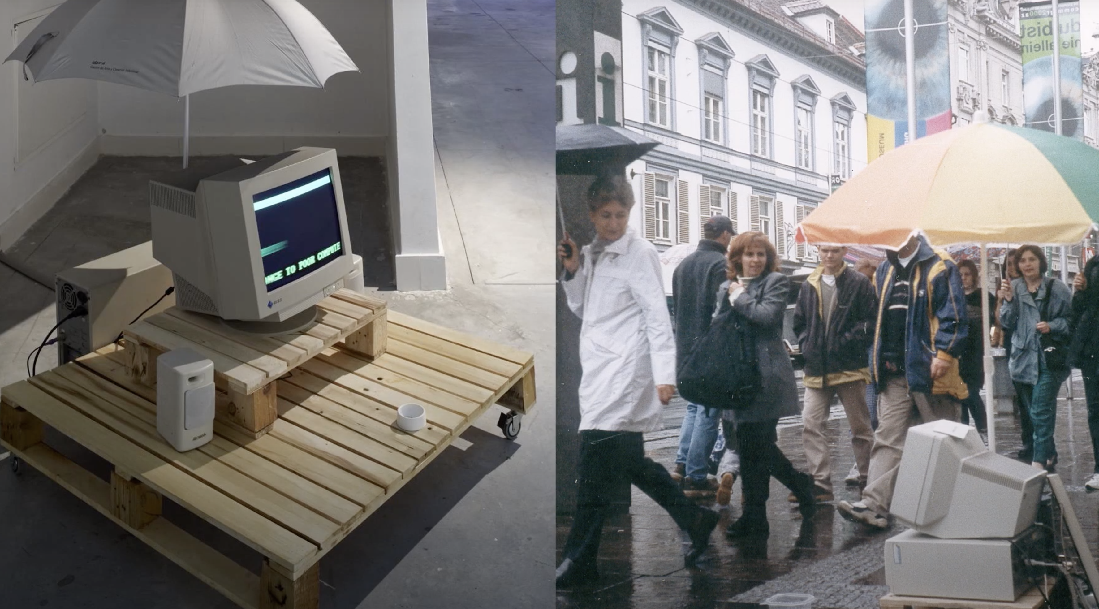 An outdoor art installation featuring an old desktop computer placed on a wooden pallet with wheels, topped with an umbrel...