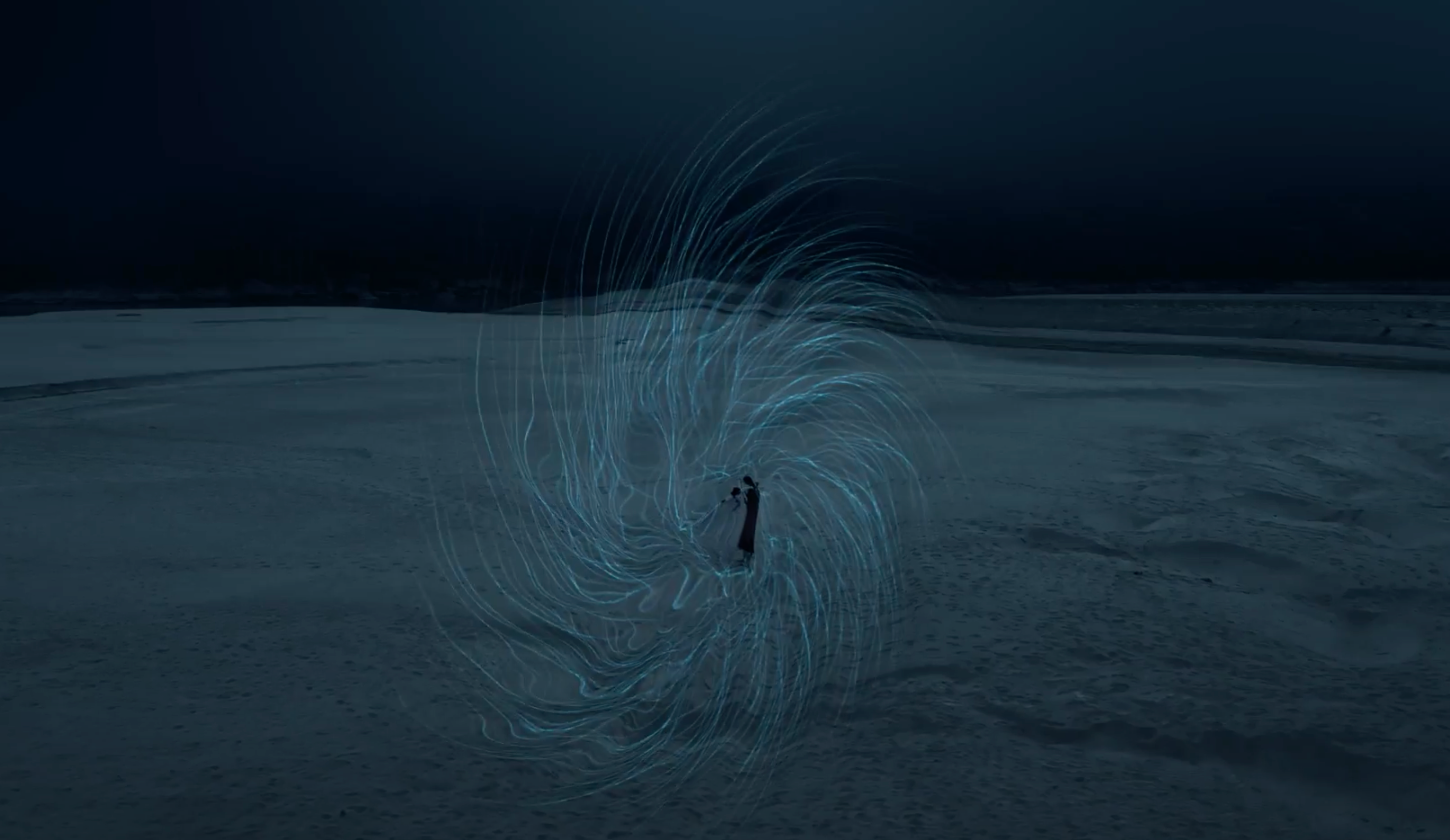 Two individuals stand in a dimly lit, expansive landscape under a dark sky, facing a wispy, formless entity in front of them.