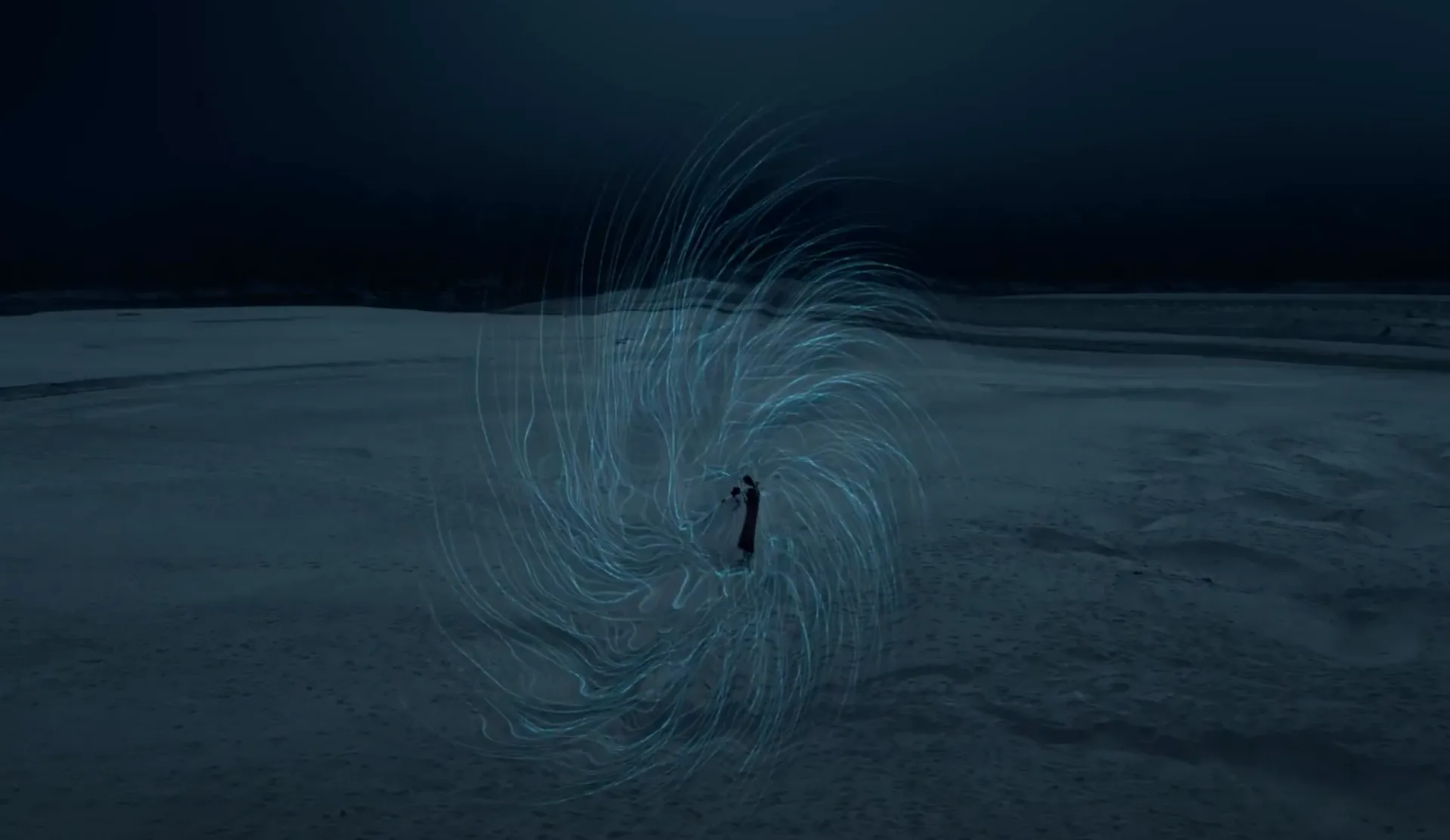 Two individuals stand in a dimly lit, expansive landscape under a dark sky, facing a wispy, formless entity in front of them.