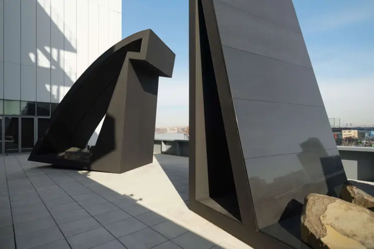 Two sculptures from Torkwase Dyson's Hyundai Terrace Commission at the Whitney Museum of American Art.