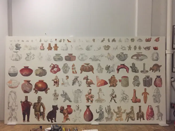 An in-progress mural featuring detailed sketches and colorful elements of ancient pottery and figurines.