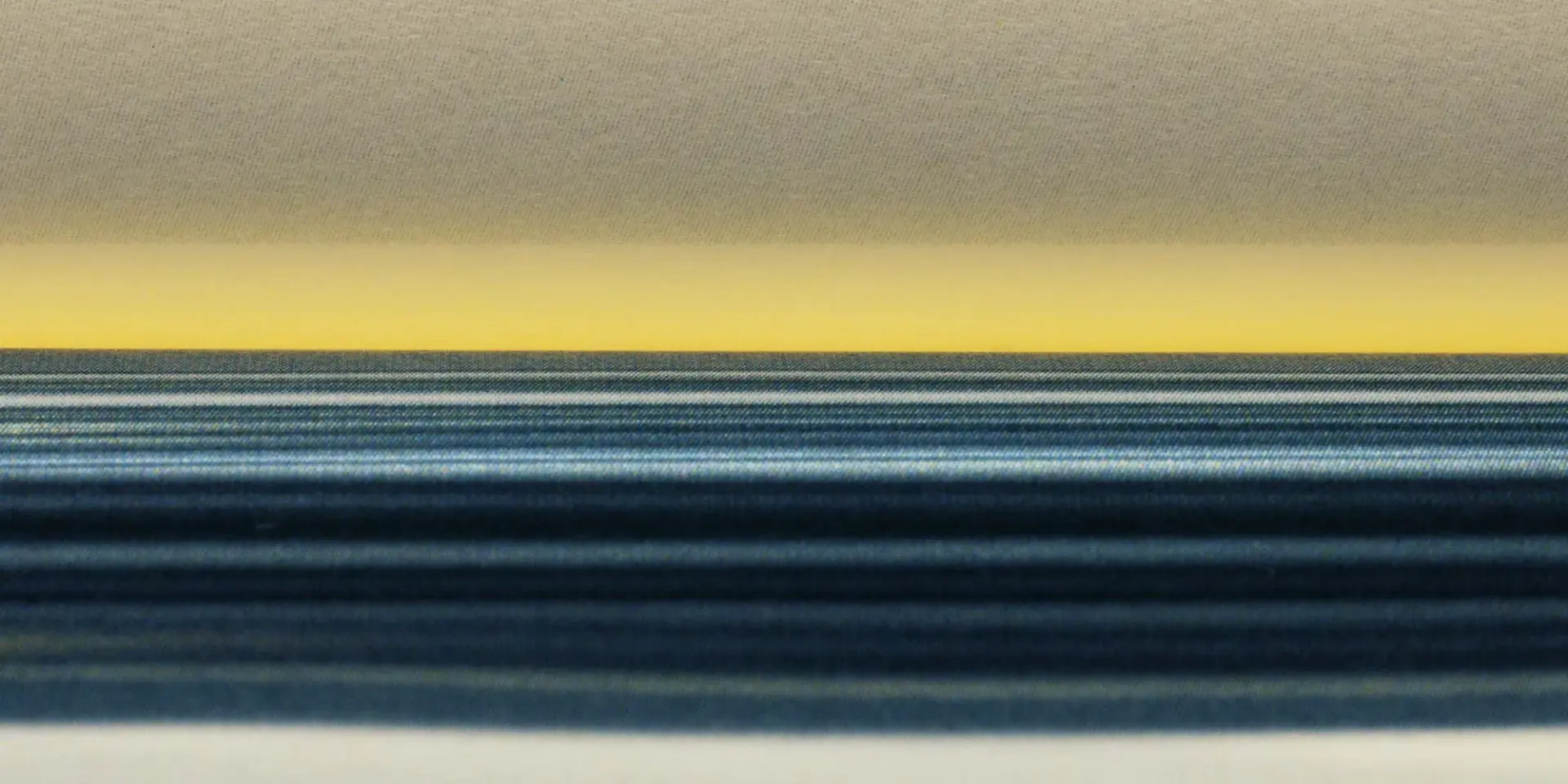 A digital artwork featuring horizontal lines and gradients in various shades of blue and yellow, creating an abstract imag...