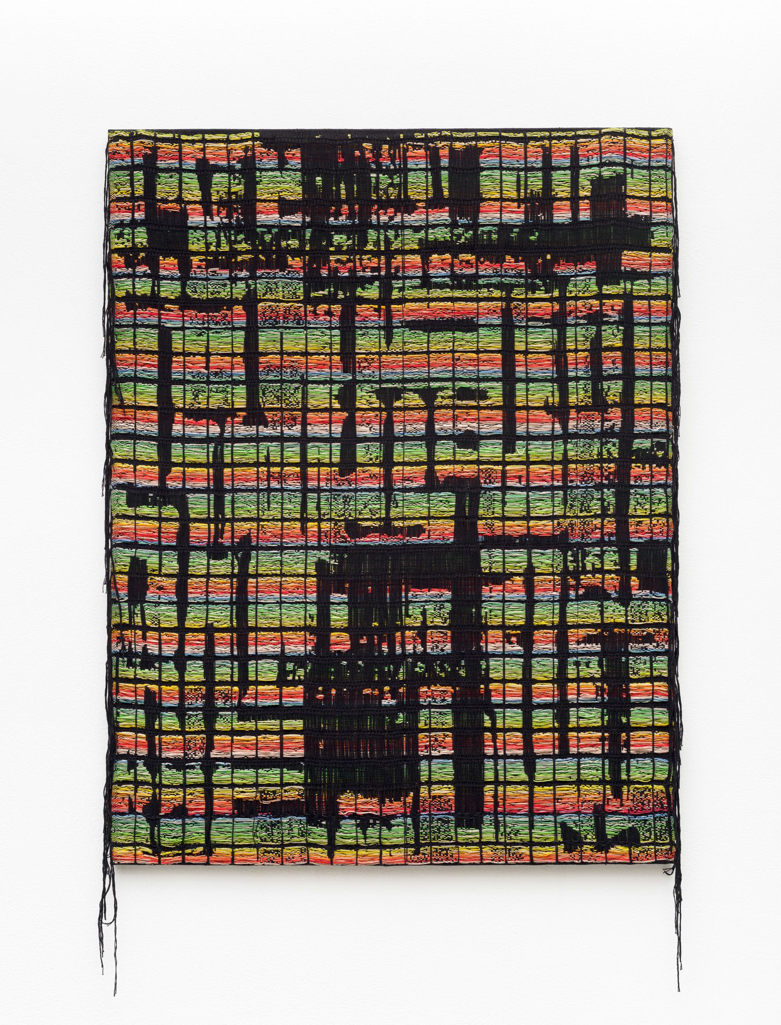 A colorful woven textile piece with black grid-like lines and vibrant horizontal stripes.