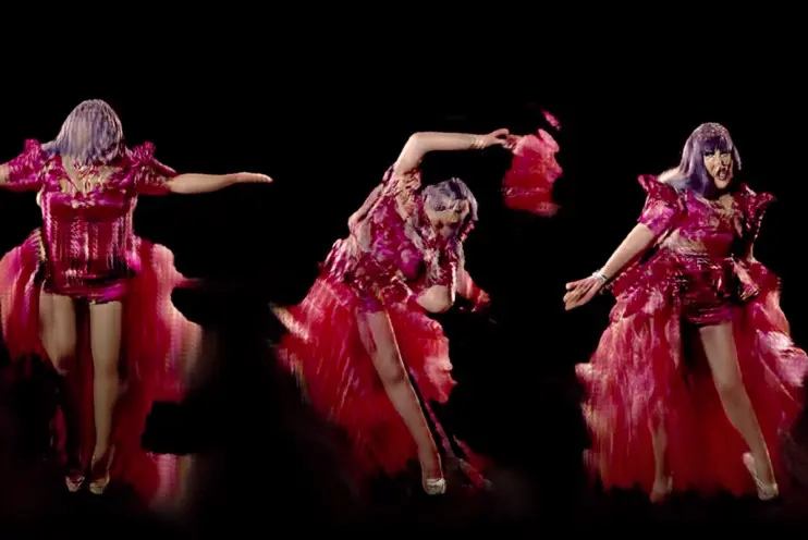 Three distinct photos of a drag queen in a vibrant red costume and purple wig arranged together against a black background.