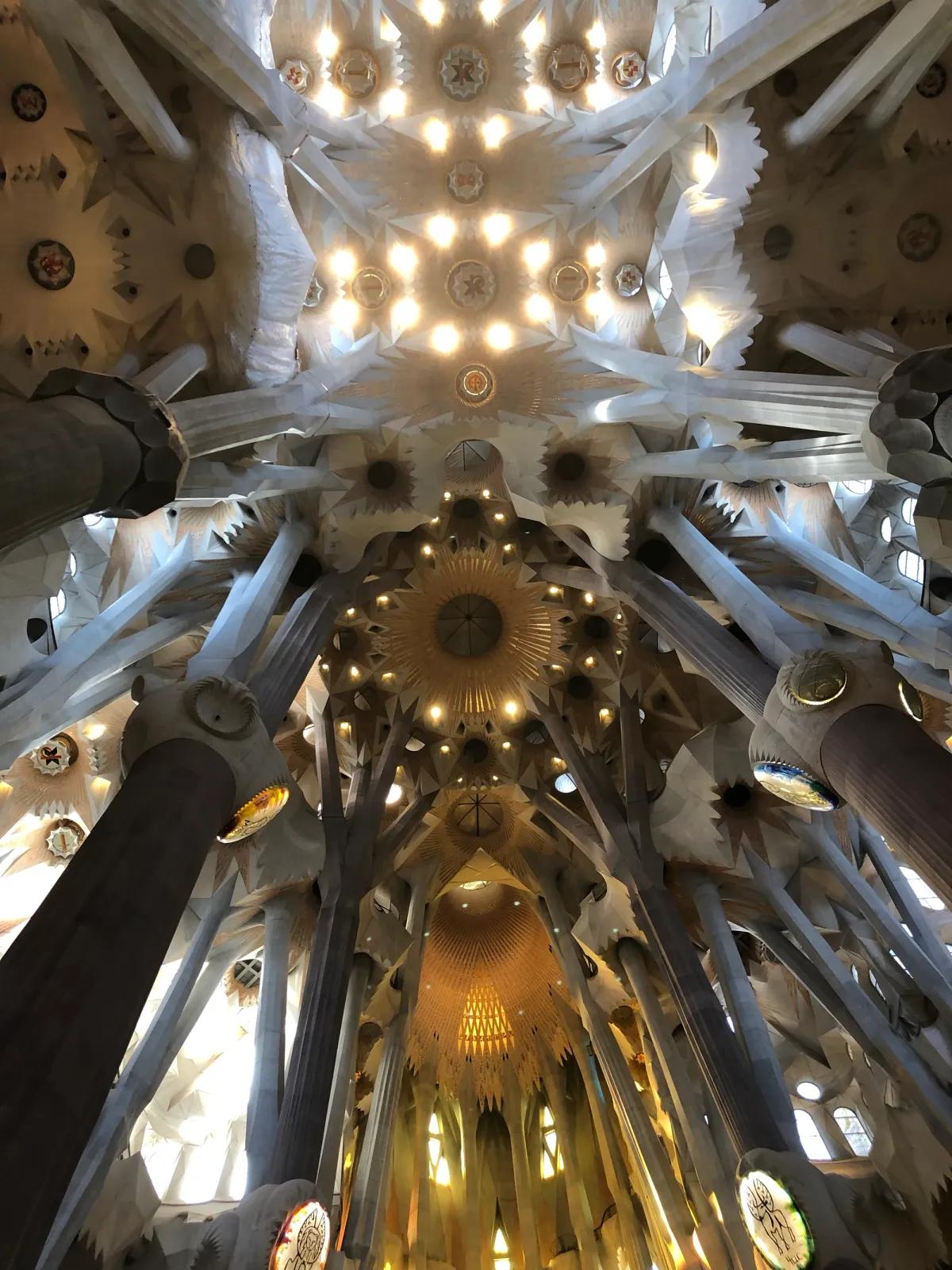 Gothic architectural details embellish the high vaulted ceiling of basilica.