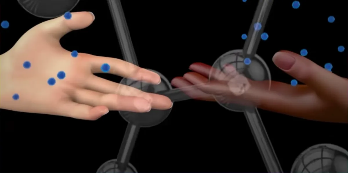 Two hands extend towards each other against a neutral background, their fingertips almost touching. Overlaid graphics of blue dots and grey geometric forms in ball and rod shapes intersect the space between the hands.