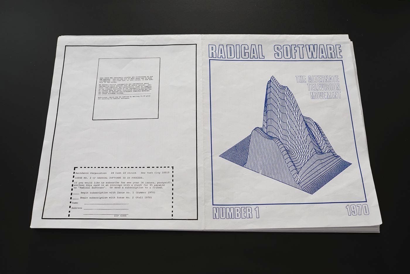A double-page spread of Radical Software magazine, Issue 1 (1970). The right page shows a 3D graph rendered in blue lines with the title "RADICAL SOFTWARE: The Alternate Television Movement." The left page includes a subscription form and introductory note in typewritten text.