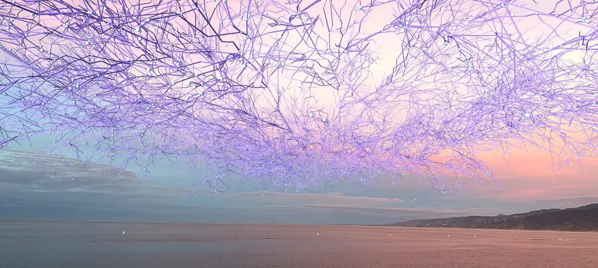 A pastel colored landscape with a large mushroom cloud, reflecting a mix of purples on frozen branches under a sky filled with water-like texture.